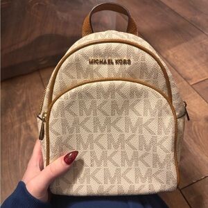 Michael Kors Tan and Brown Mini Monogram Backpack
